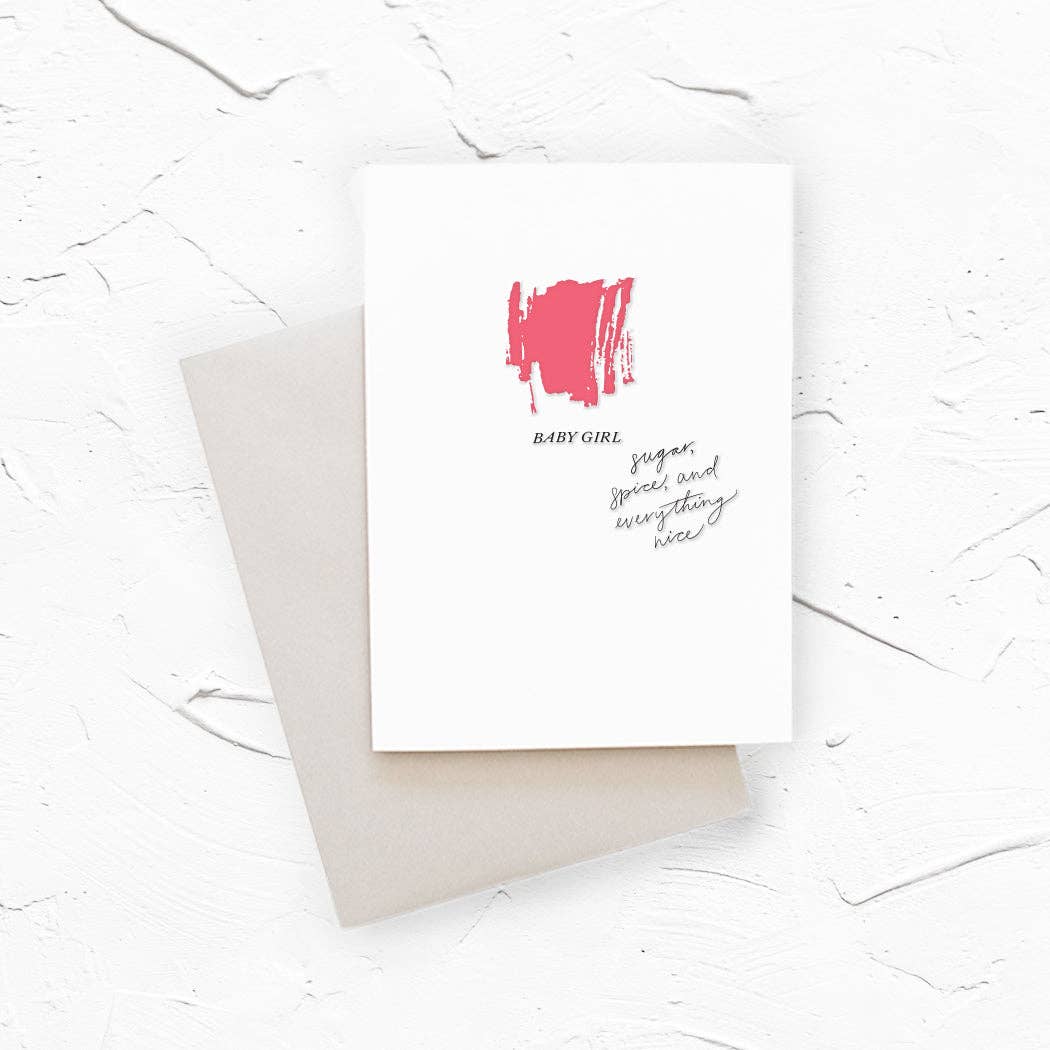 Cover of a card for a baby baby girl with a dark pink paint stroke and the text 'BABY GIRL' and 'sugar, spice, and everything nice' in black, shown with a light gray envelope.