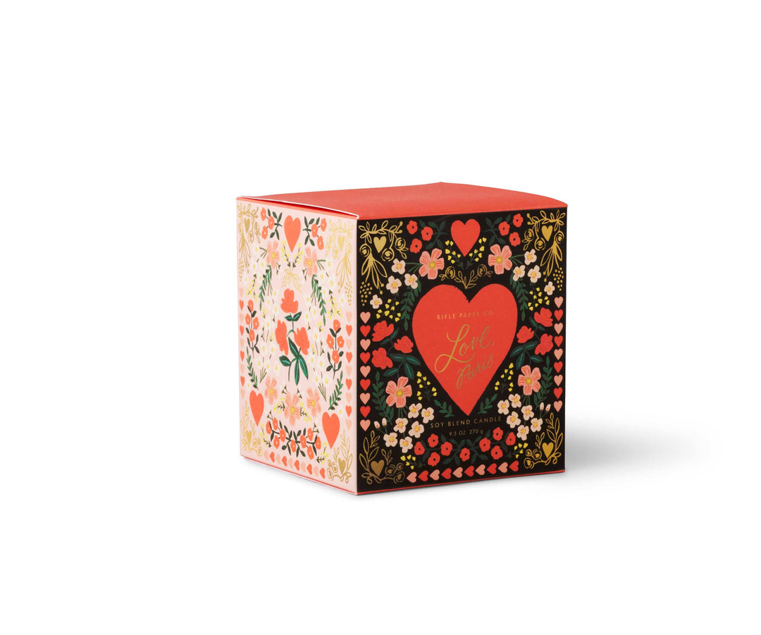 Decorative box with floral patterns and a heart design.