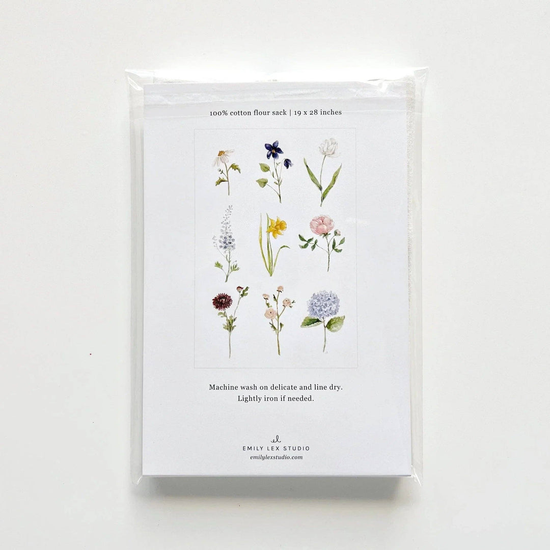 Back of package showing the nine different blooms on the towel.