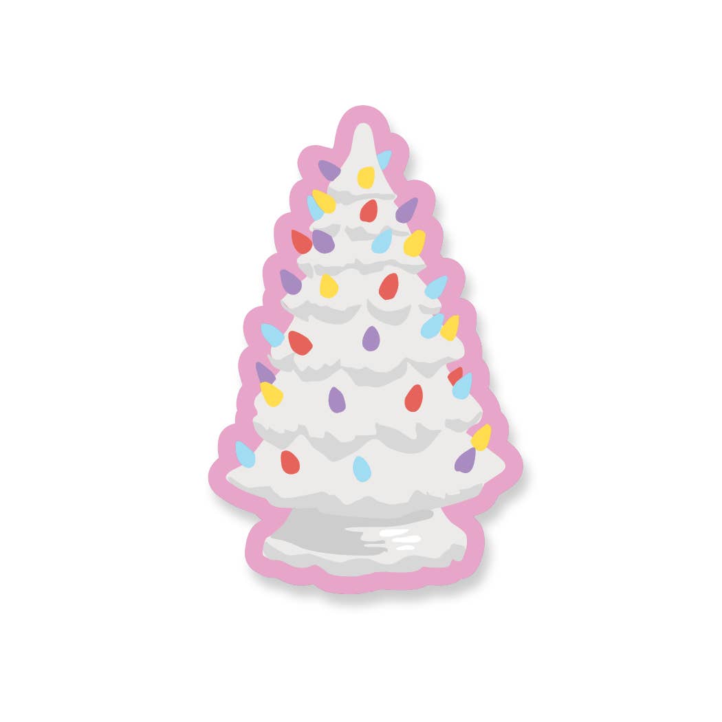 White Christmas tree with colorful lights on a pink background.