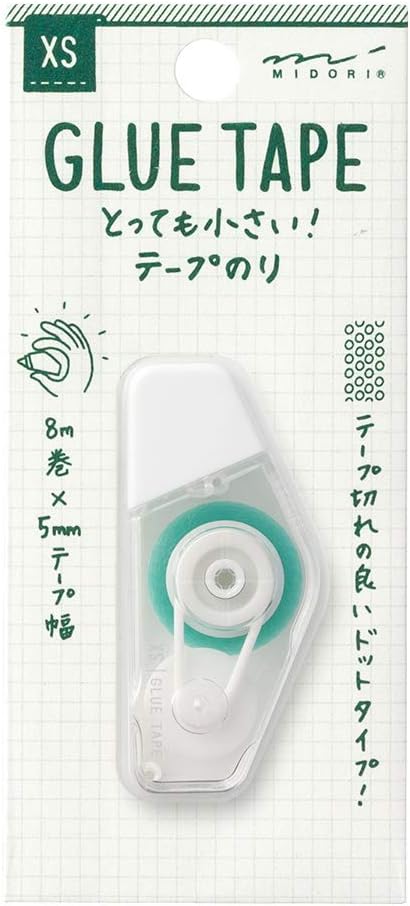 A package of Midorin XS mini glue tape dispenser on a white grid background card. The dispenser is white with a mint green inner roller.
