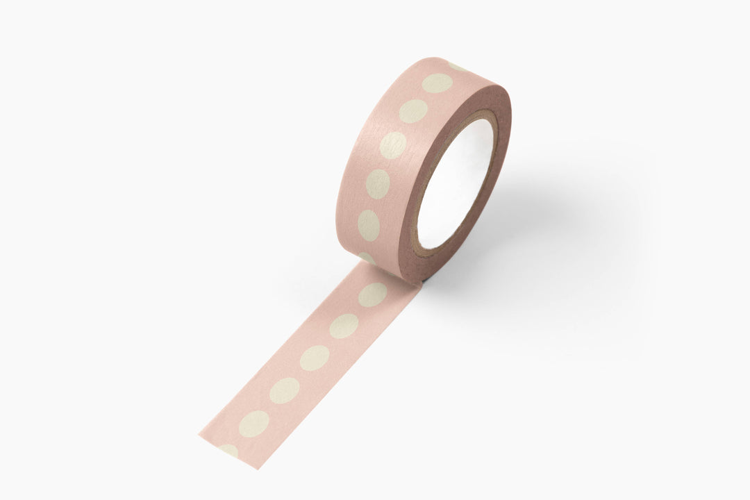 Roll of pink washi tape with white dots
