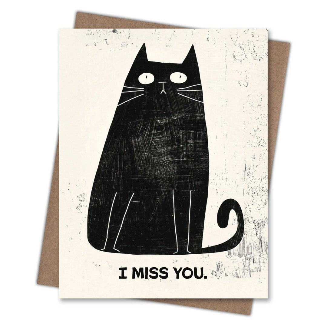 Greeting card with a black cat illustration and 'I MISS YOU' text on a textured beige background.