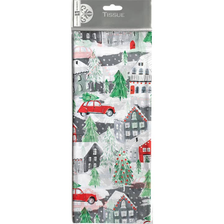 Tissue paper with Christmas village design featuring houses, trees, and a red car carrying a Christmas tree.