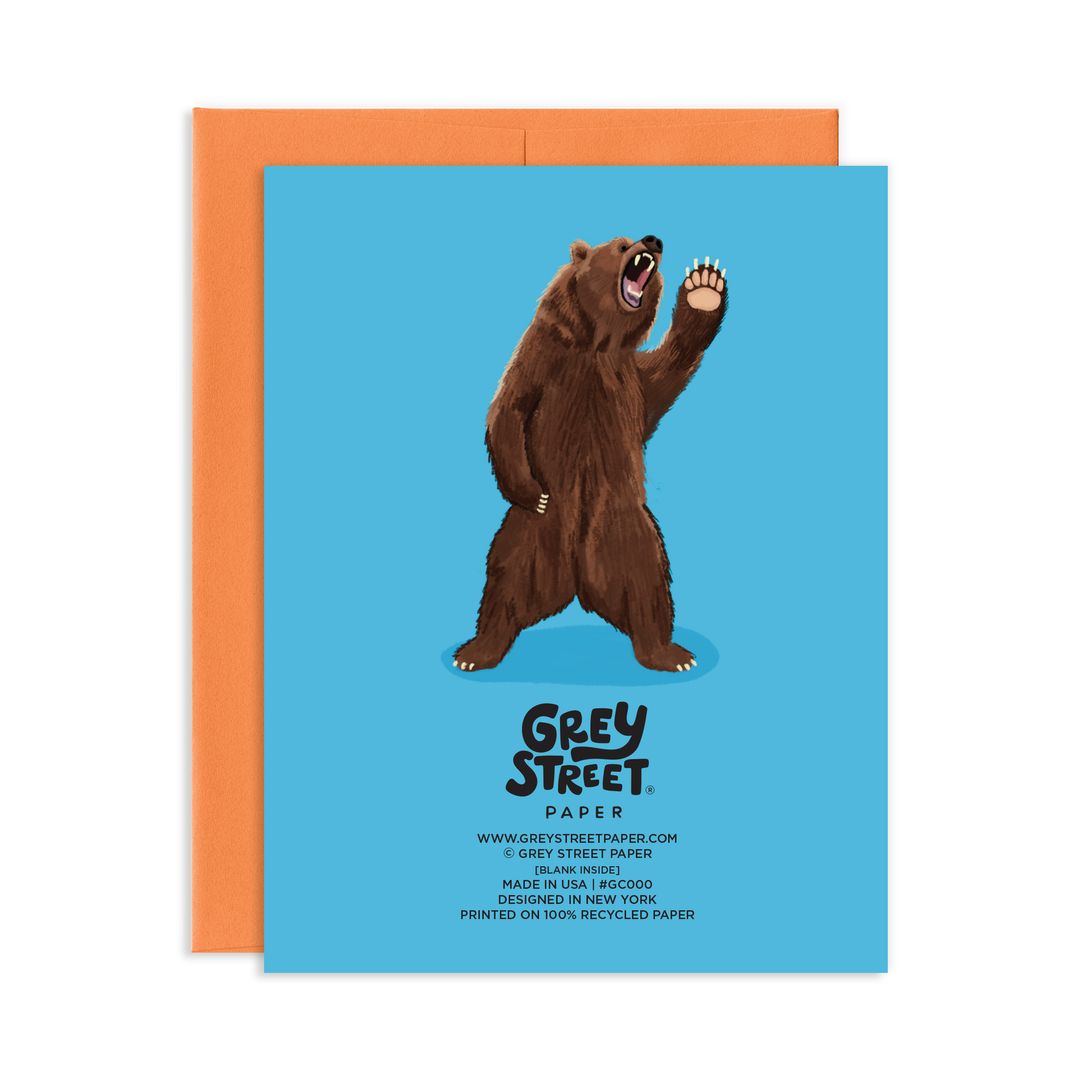 Back of card with the bear giving a high five without the speech bubble, placed above Grey Street info.