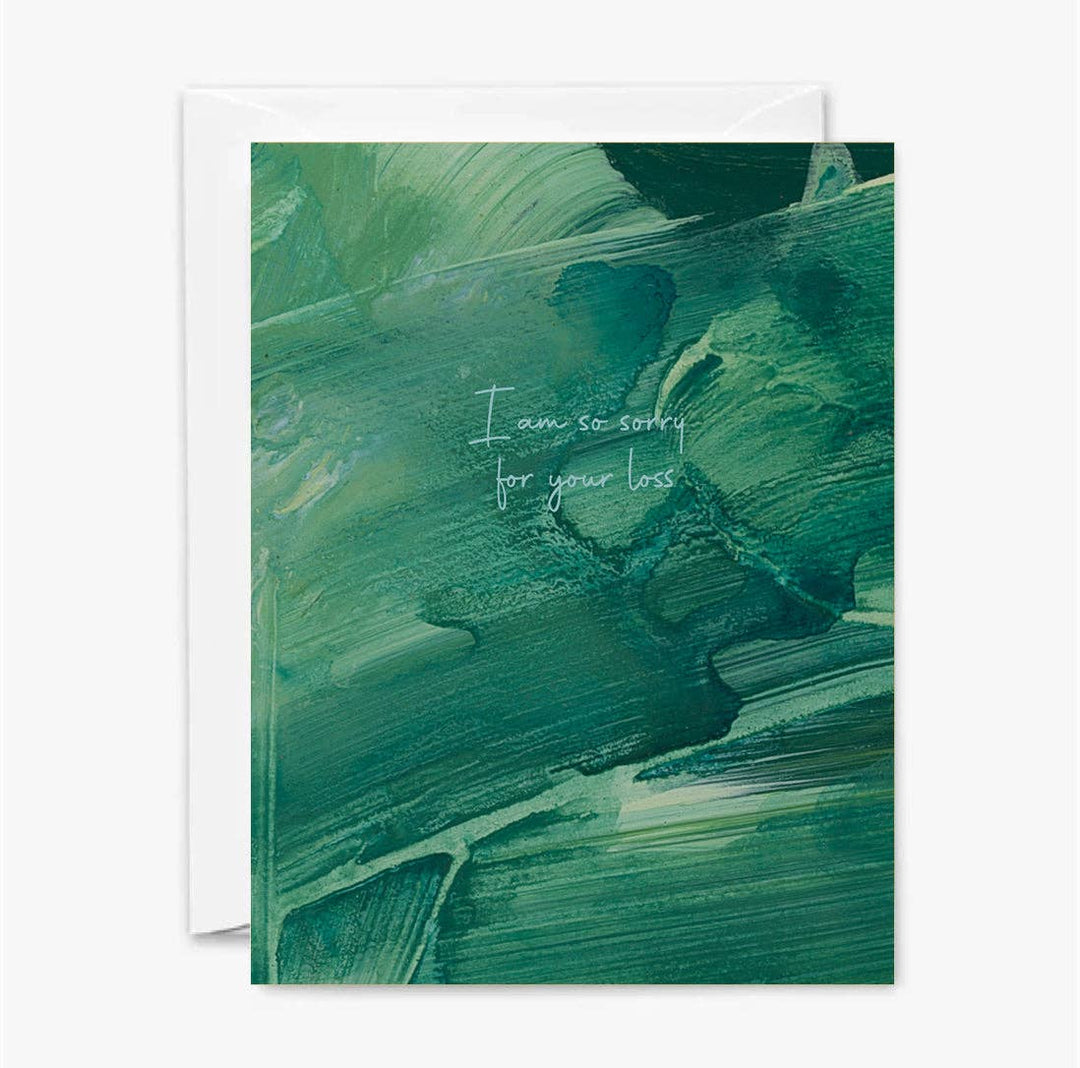 Front of sympathy card with abstract design in greens with white text 'I am so sorry for your loss.'