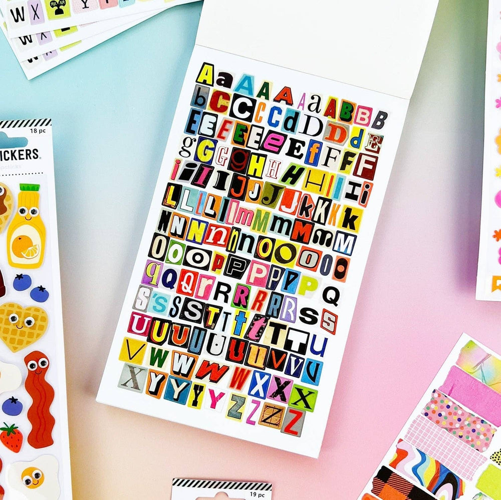 Colorful alphabet letter stickers in ransom note designs.