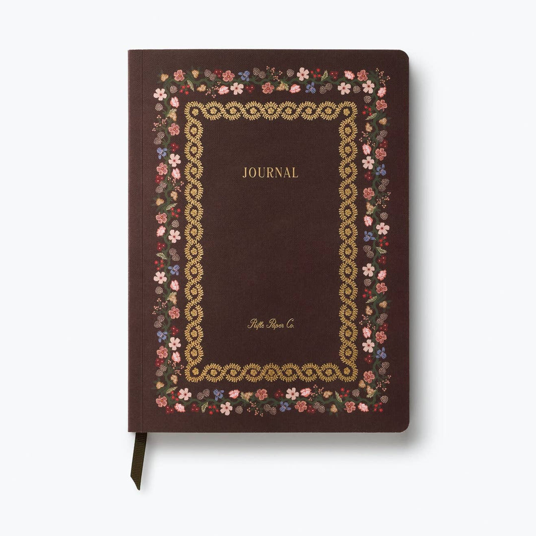 Brown journal with floral border and 'Journal' embossed on cover.