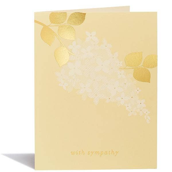 Gold foil leaves and light white flower on light yellow cardstock.