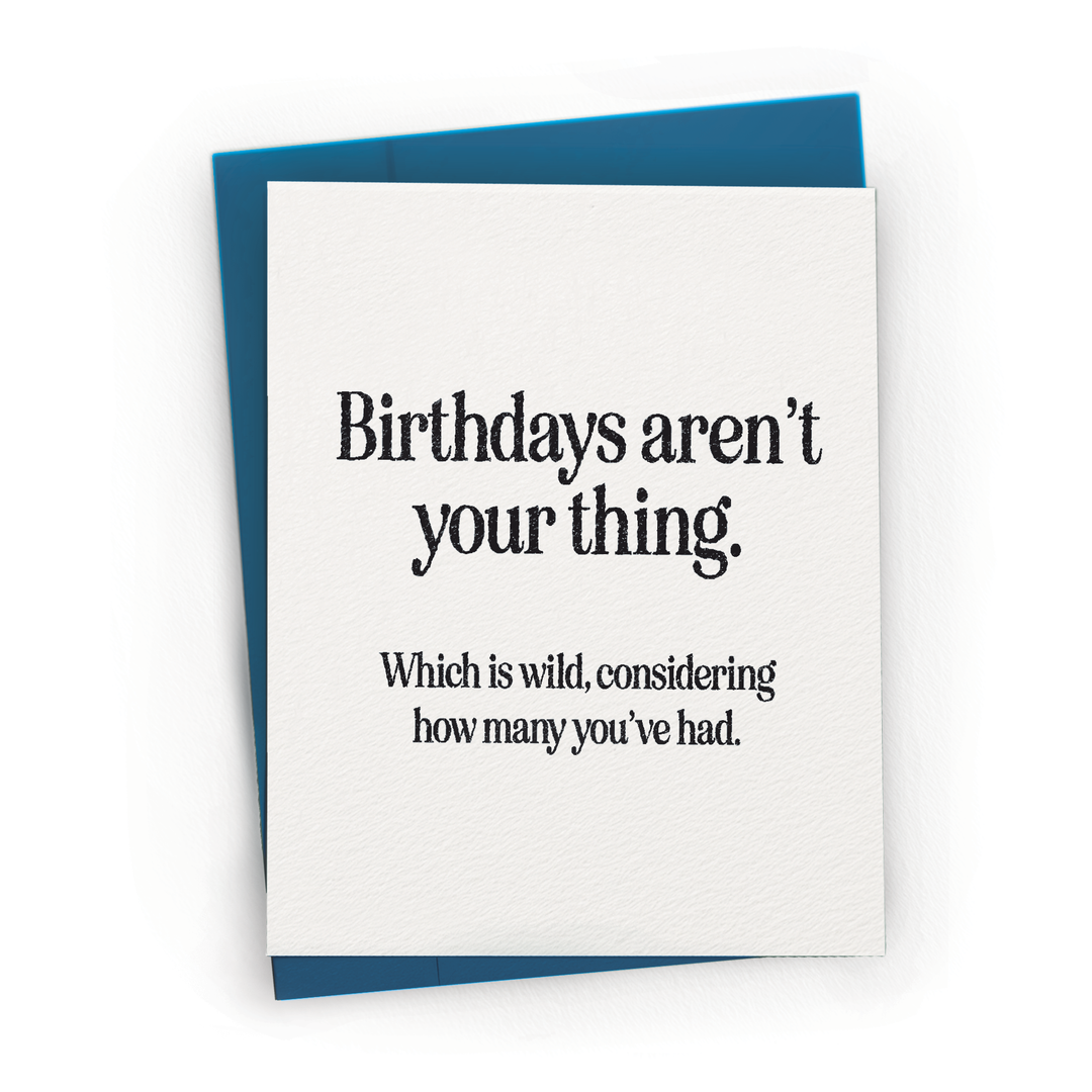 Greeting card with humorous birthday message on a white background