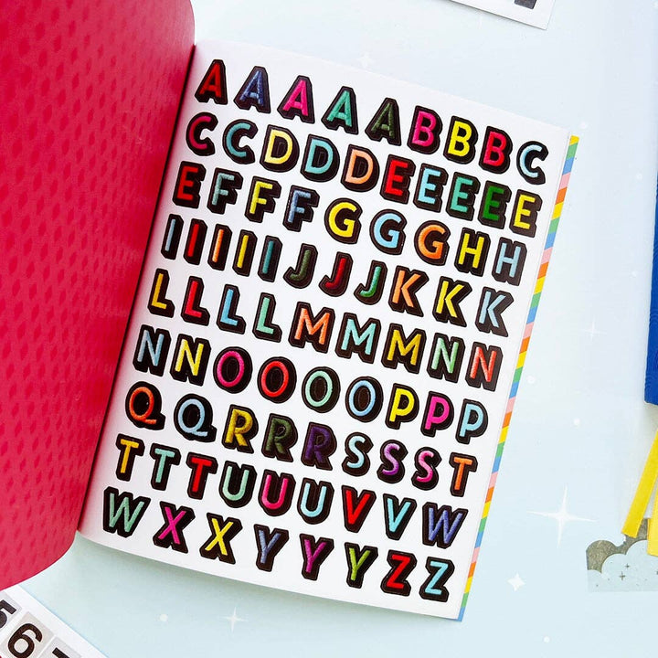 Page of alphabet stickers in various colors.