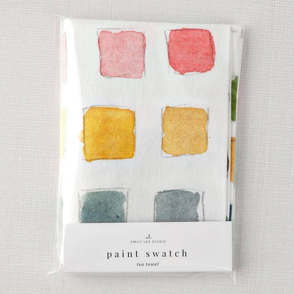 Towel in its package, showing six of the colored squares.
