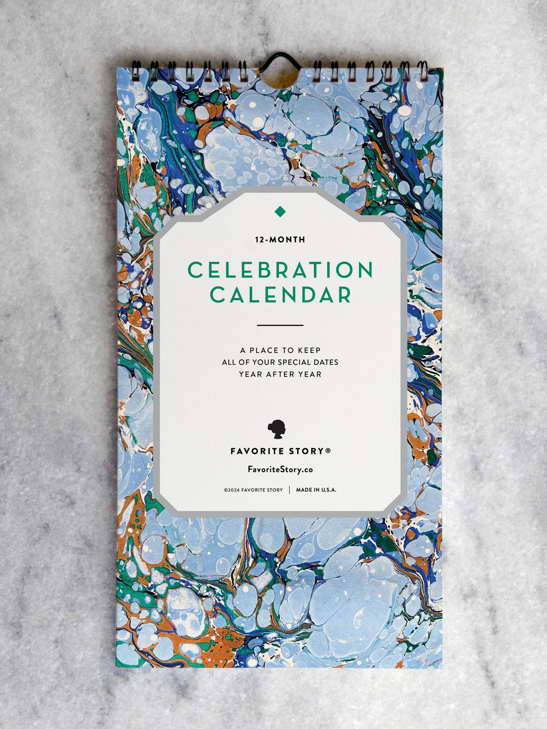 Cover of the calendar with marbled paper in shades of blue