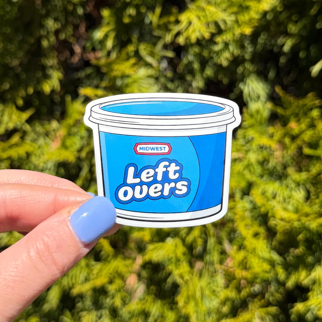 Blue sticker in the shape of a dairy container with the text "Midwest Leftovers."