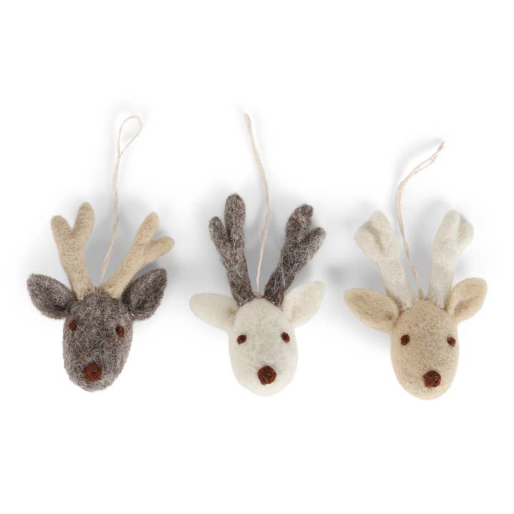 Three felt reindeer faces in grey with beige antlers, white with grey antlers, and beige with white antlers. With a string for hanging.