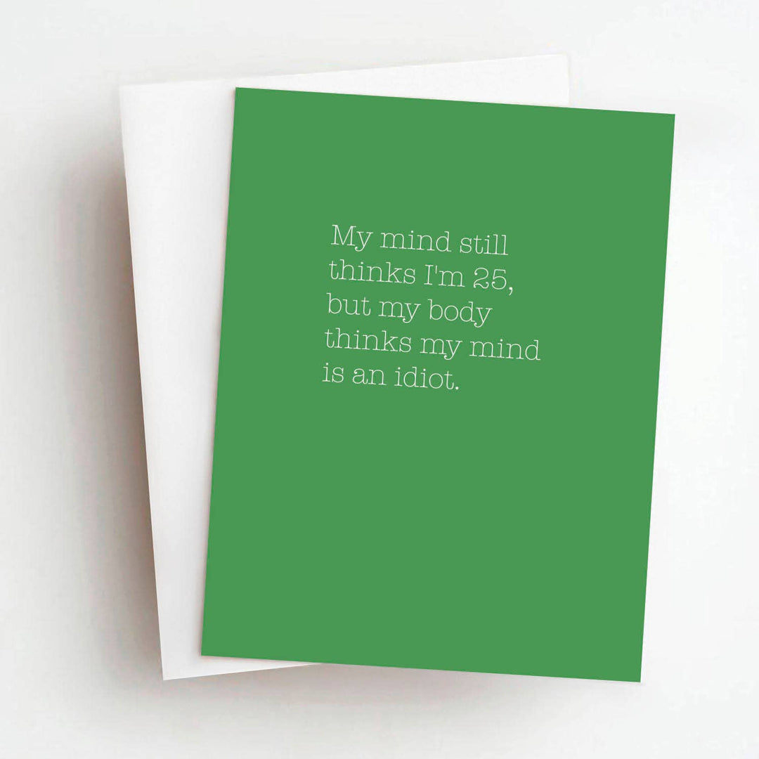 Front of greeting card with white text on green card stock.