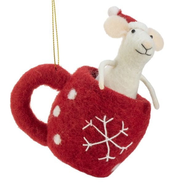Felt ornament of a white mouse, earing a Santa hat, in a red felt teacup with a snowflake design 