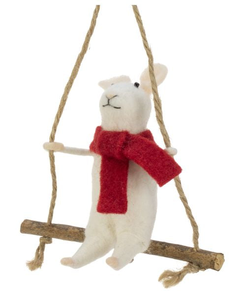 White mouse with a red scarf on a long swing with rope.