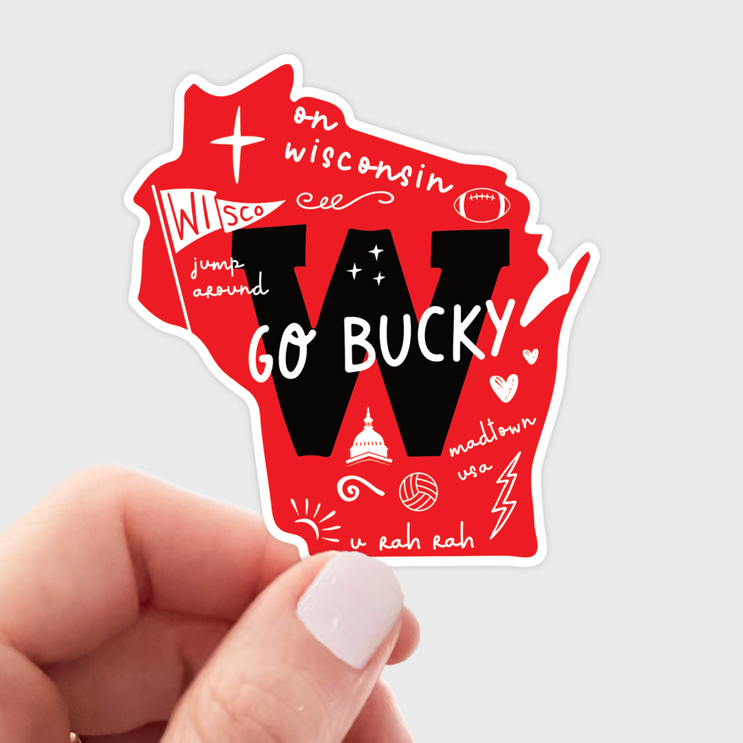 Sticker in the shape of the state of Wisconsin in red, with a large black 'W' and other text and symbols in white.