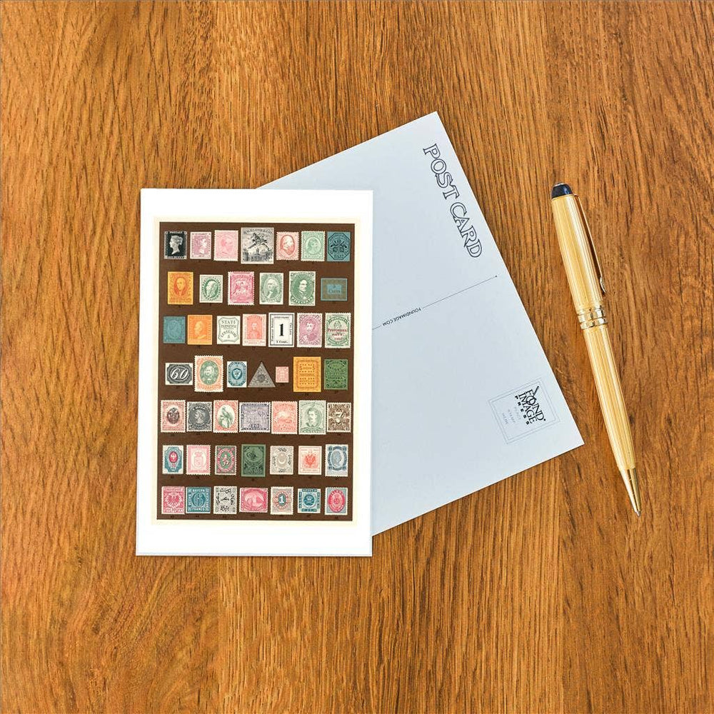 Front and back of postcard next to a pen.