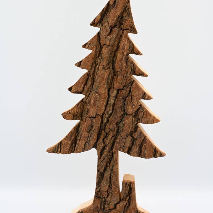 Carved pine tree, with stump.