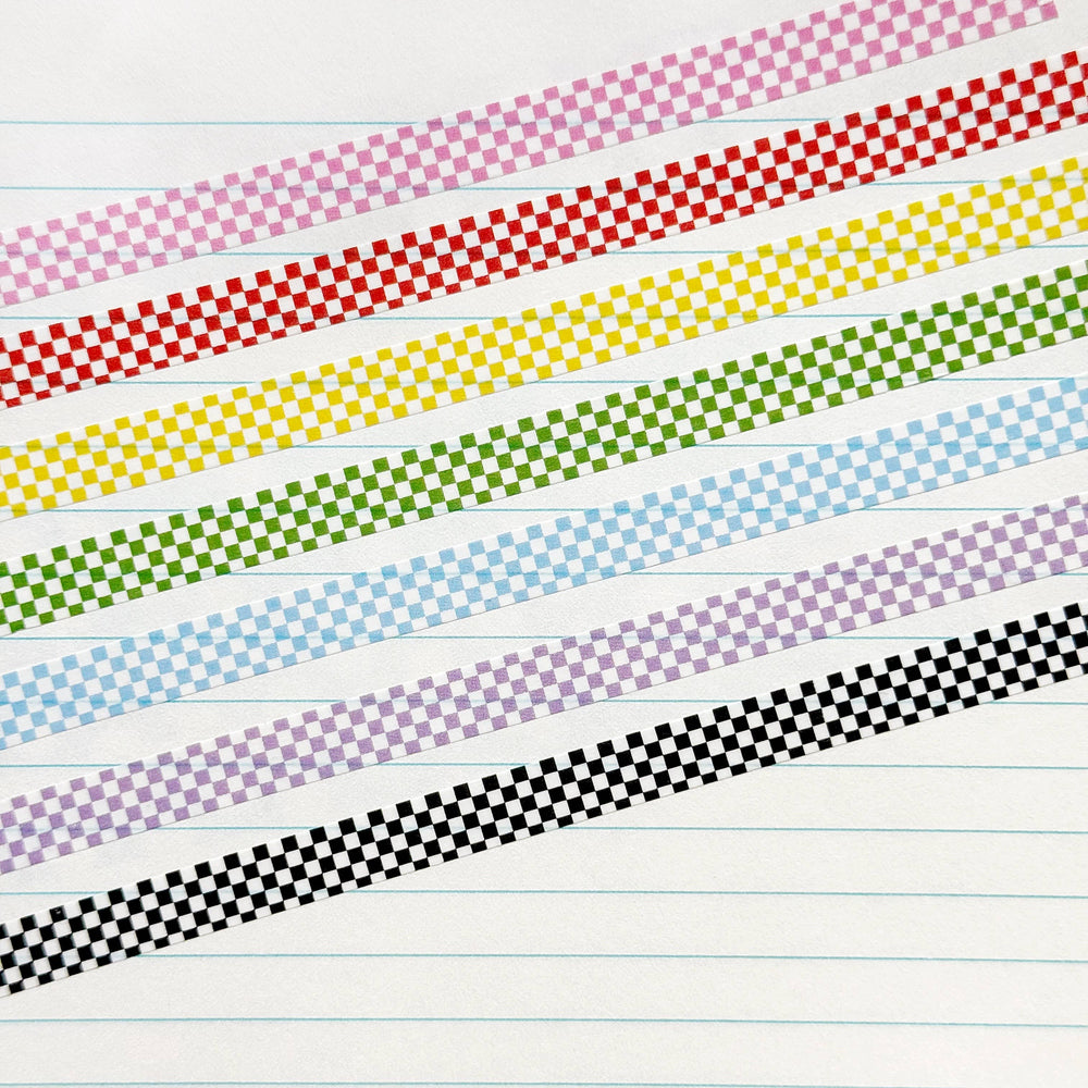 Seven different colors of checkered washi tape on lined paper.