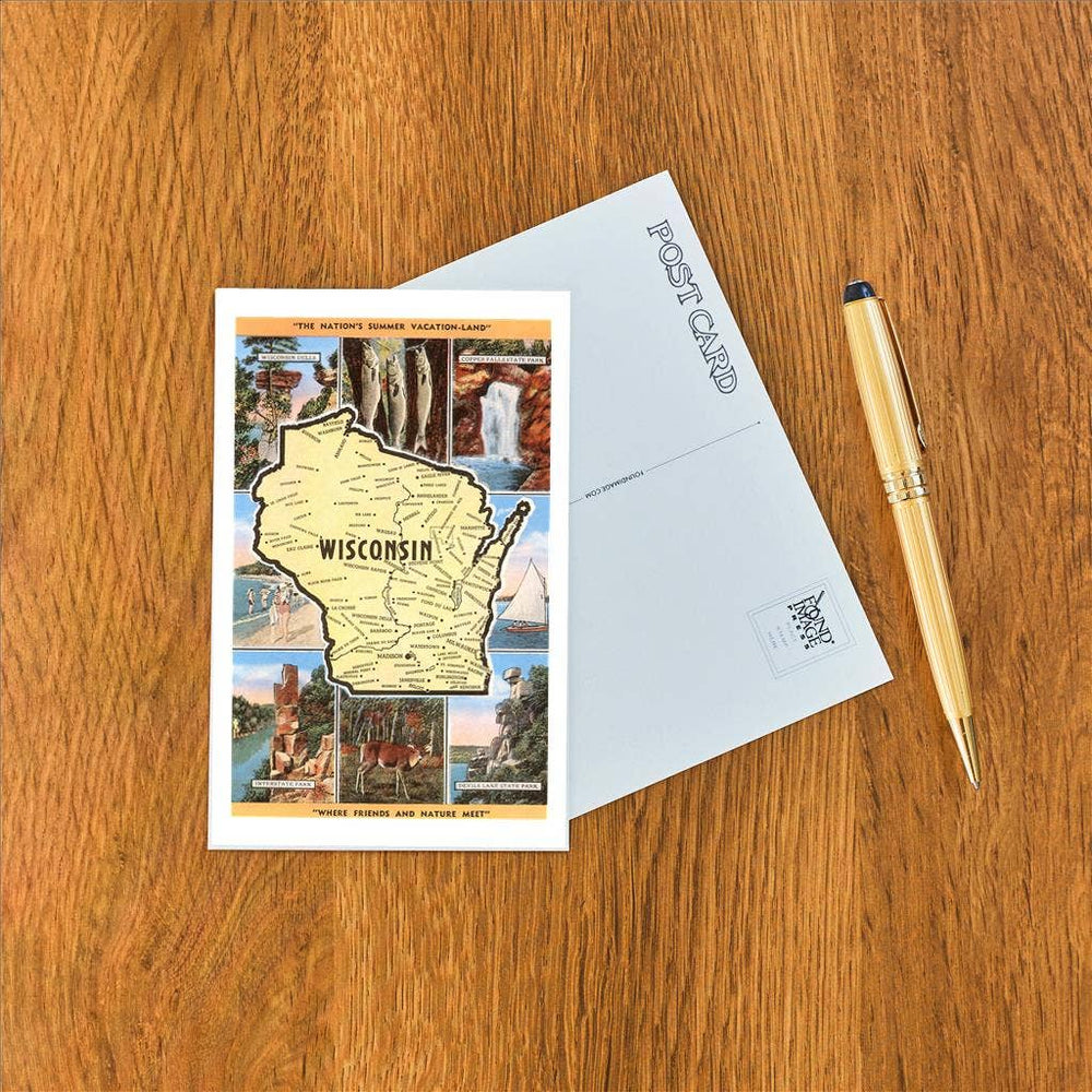 Front and back of card next to a pen.