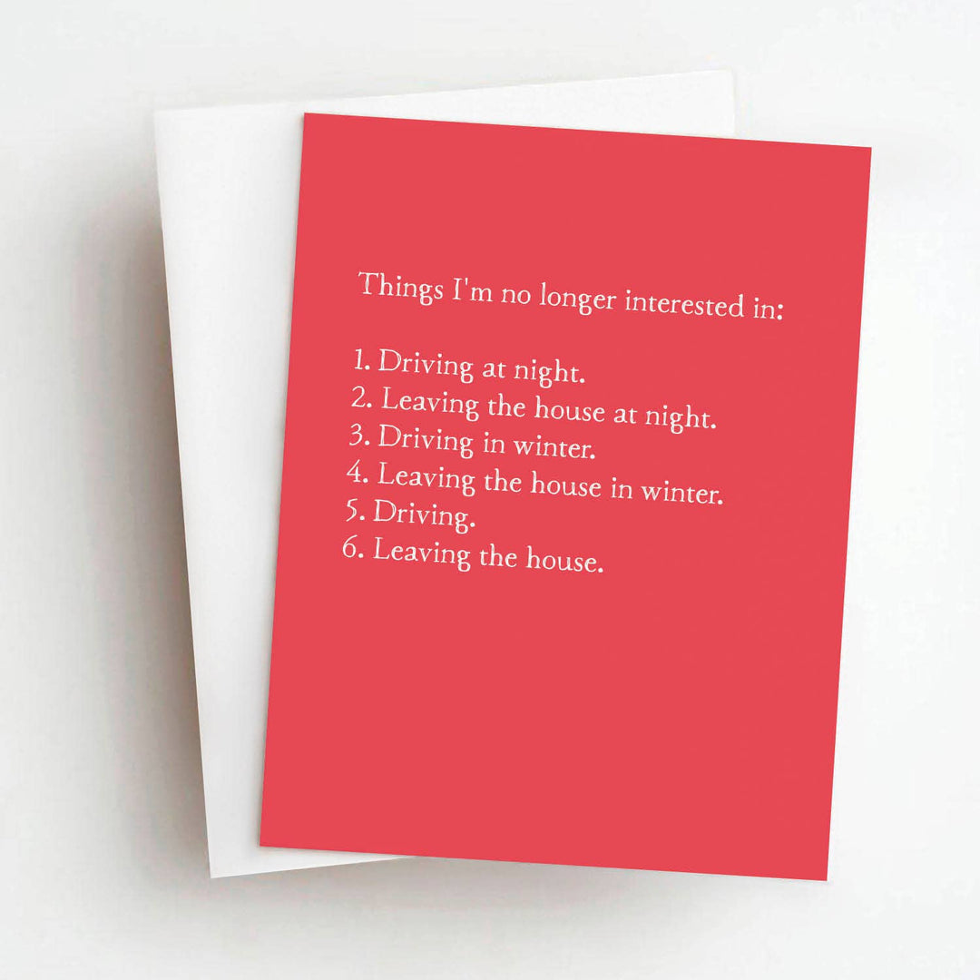 Front of greeting card with humorous text in white on red card stock.