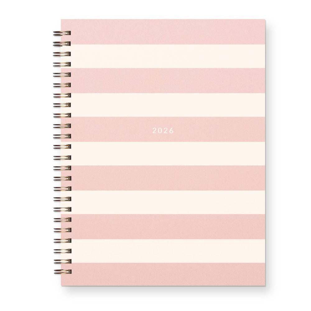 Pink and white striped planner cover with '2026' printed one one of the pink stripes Wire-O binding on the left.