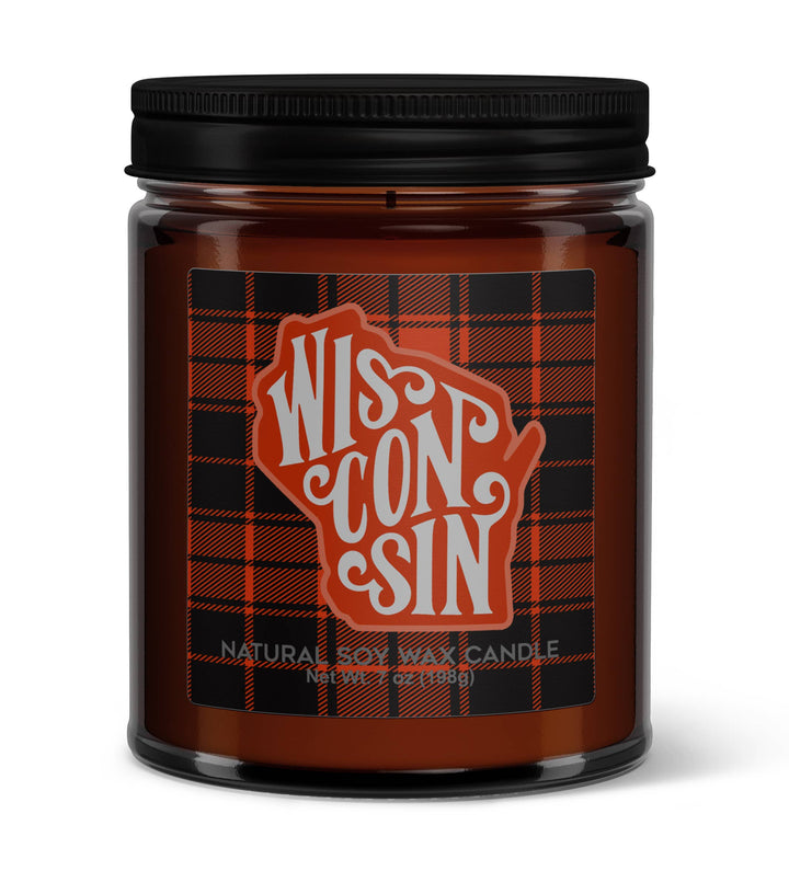 Candle jar with 'Wisconsin' text in script in an outline of the over a square of buffalo plaid.