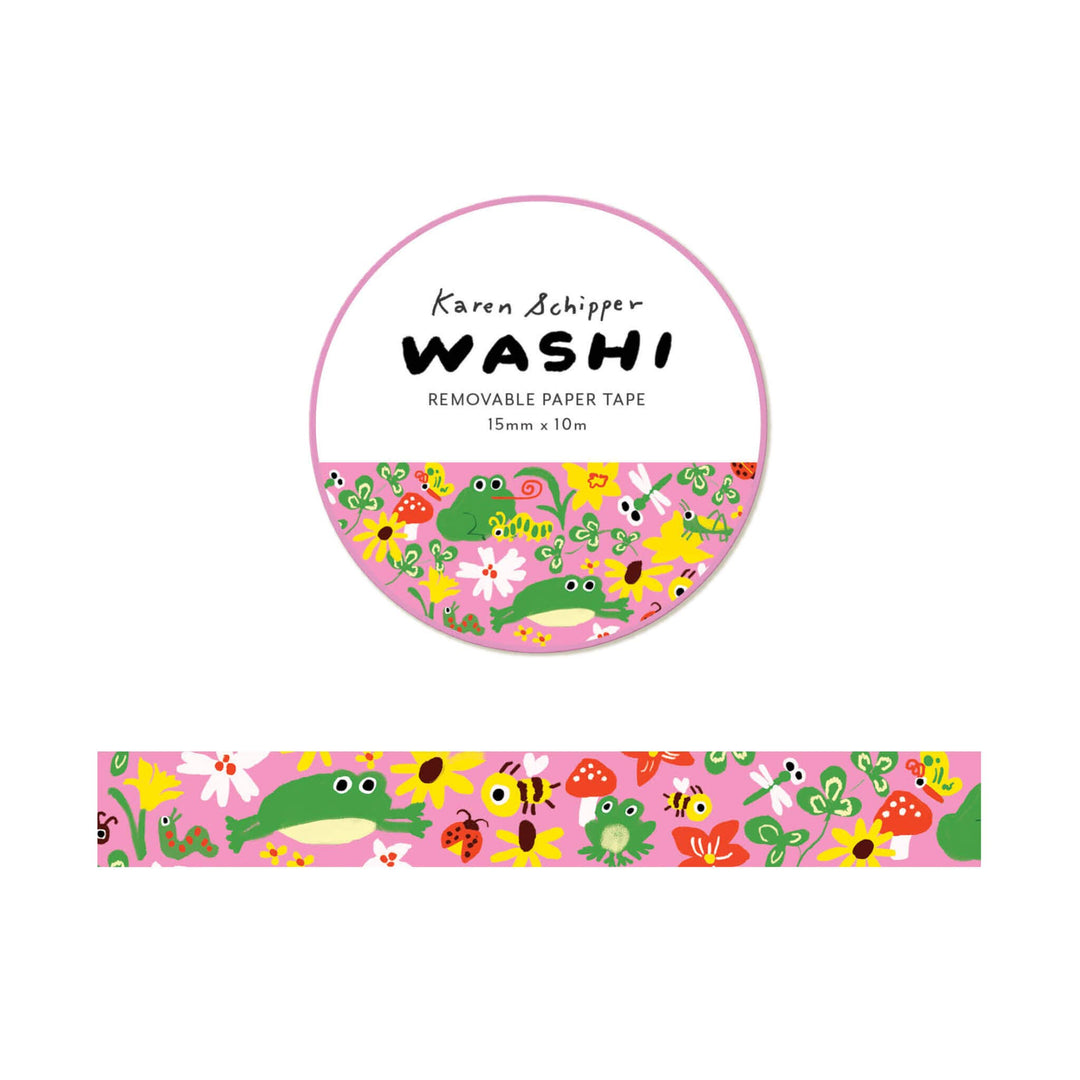 A roll of Karen Schipper WASHI removable paper tape with a colorful spring pattern of green frogs, yellow flowers, and ladybugs, shown with its white paper label and a strip of the tape below.