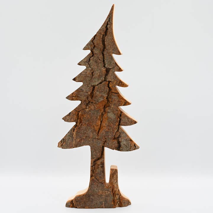 Carved pine tree, with stump.