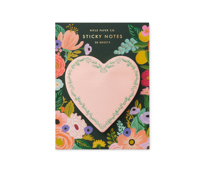 Sticky notes with a heart design and floral border on a backing with colorful flowers.