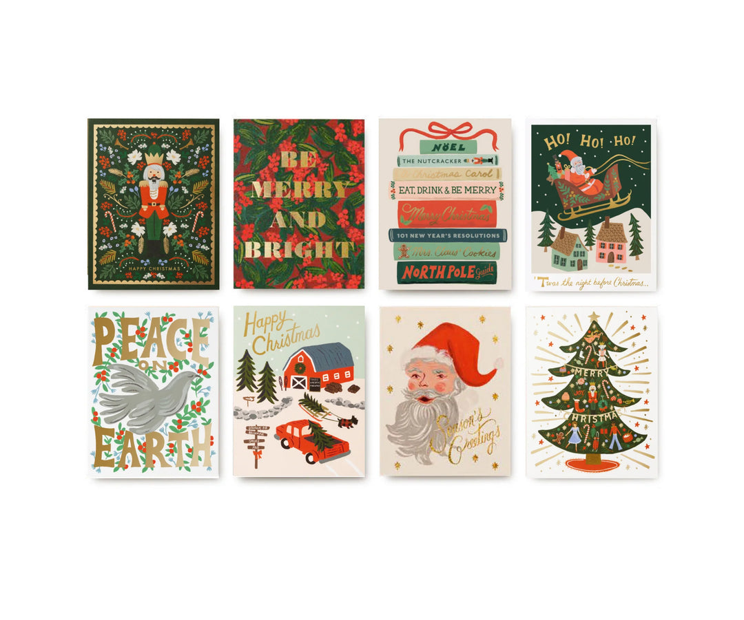 A set of eight Christmas greeting cards arranged in a 2x4 grid. The cards feature various festive illustrations including a nutcracker, a red berry wreath with the words 'Be Merry and Bright', a New Year calendar, Santa in a sleigh, a dove with 'Peace Earth', a snowy barn with a red car and 'Happy Christmas', Santa with 'Merry Christmas', and a decorated Christmas tree.