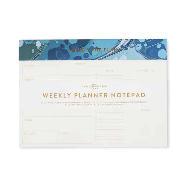 A weekly planner notepad featuring a cream-colored page with gold lettering and lined sections for daily planning, with a blue marbled header band.