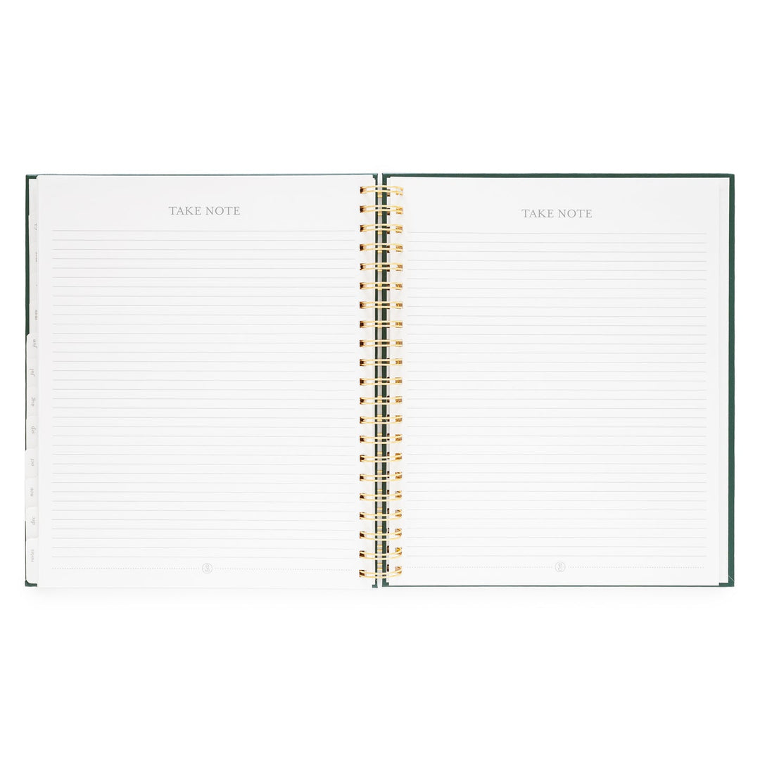 Planner opened to show lined pages for recording notes.