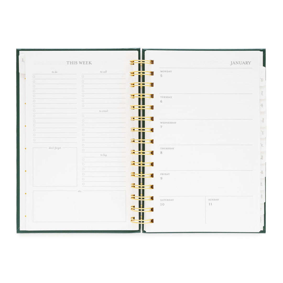 Planner opened to show a space for note for the week on the left, and the week on the right.