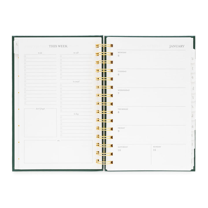 Planner opened to show a space for note for the week on the left, and the week on the right.