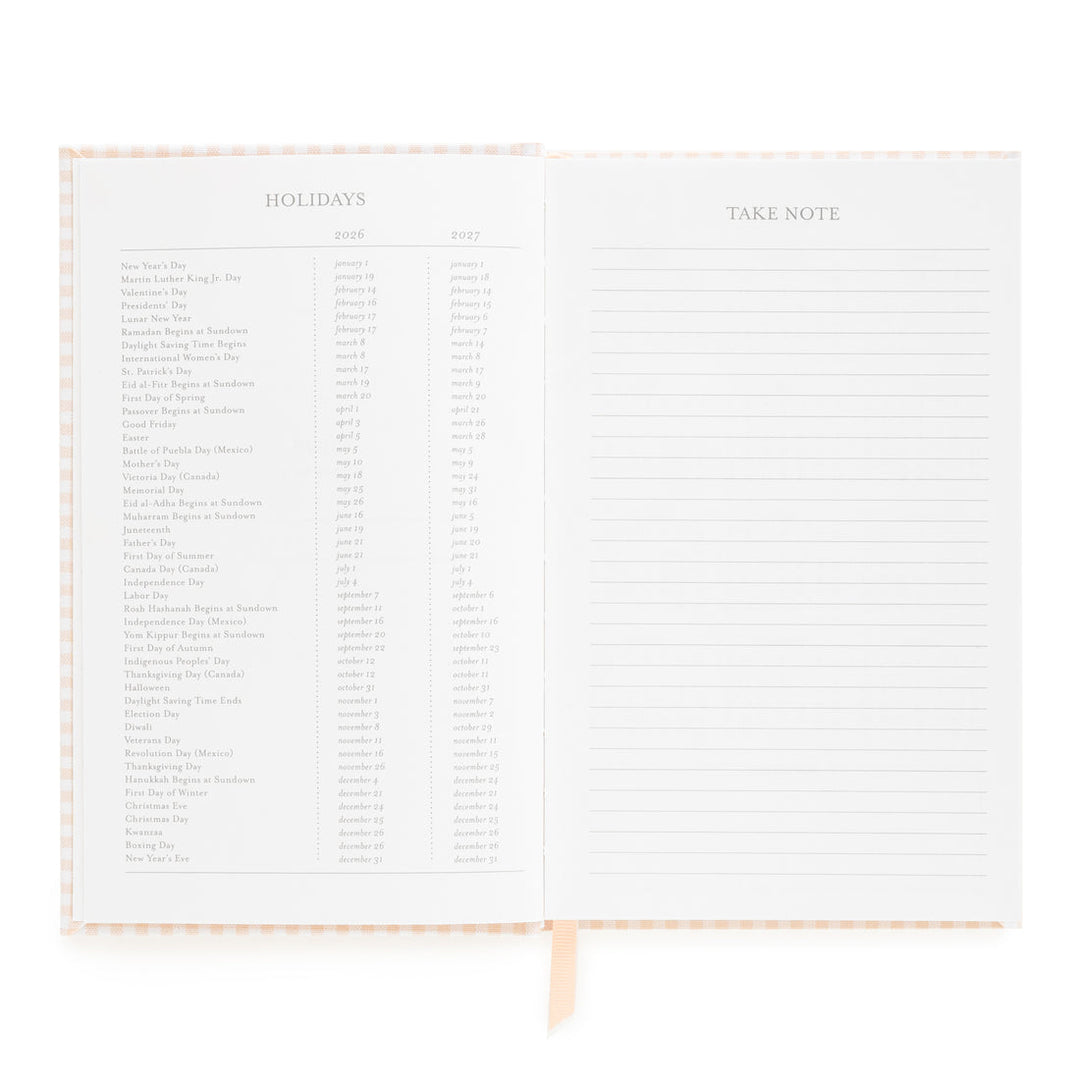 Planner opened to show a list of holidays on the left and a space for notes on the right.