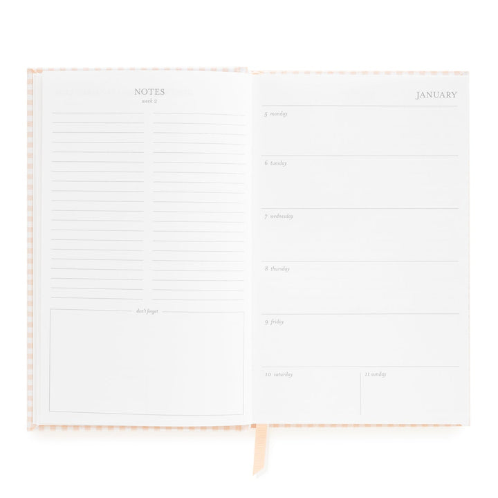 Notebook opened to show sections for notes on the left and the first week in January on the right.