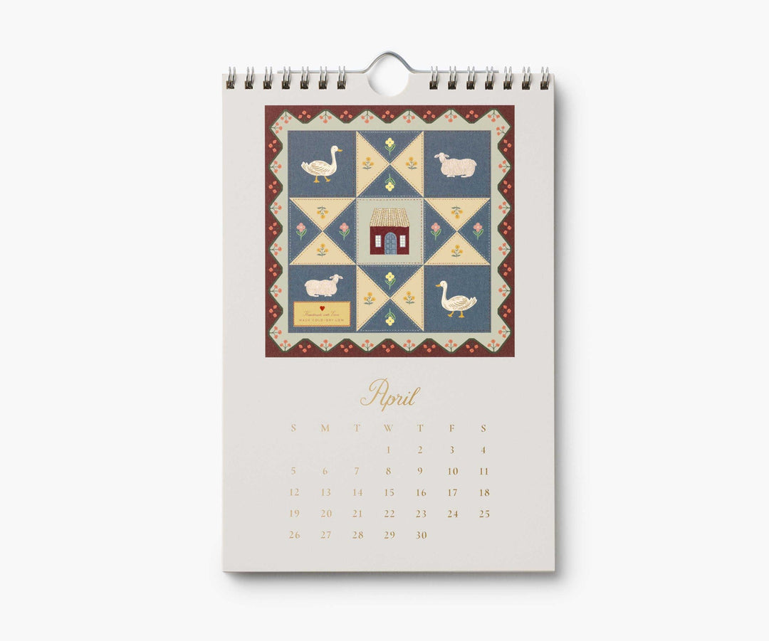 Calendar page for April with illustration of a 3x3 quilt, with two ducks, two sheep, and a house in the middle, above the calendar for April , 2026.