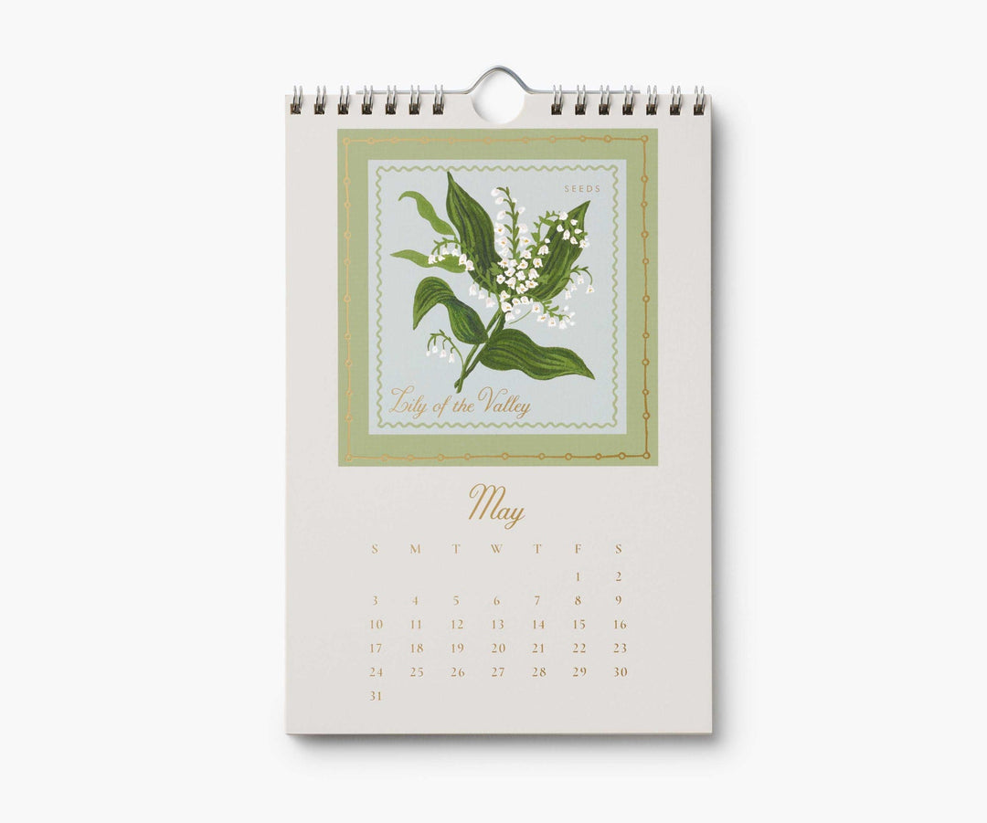 Calendar page for May with illustration of a lily of the valley, above the calendar for May , 2026.