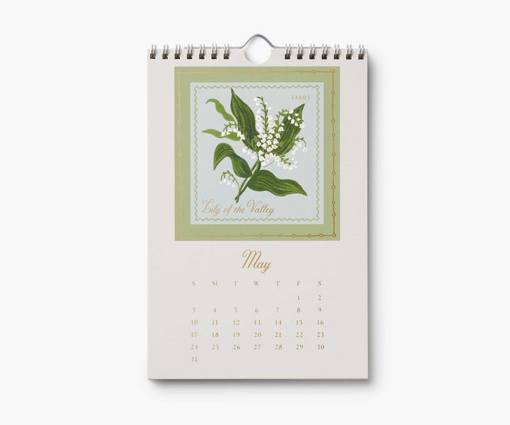 Calendar page for May with illustration of a lily of the valley, above the calendar for May , 2026.