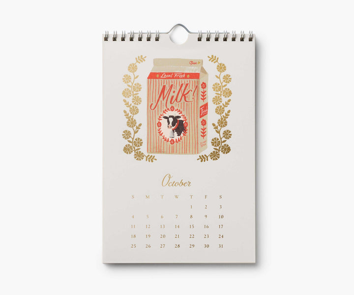 Calendar page for October with illustration of a carton of milk, with a black and white cow, above the calendar for October, 2026.