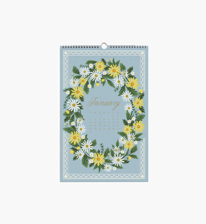 The calendar page for January with a wreath of yellow and white flowers on a light blue background.