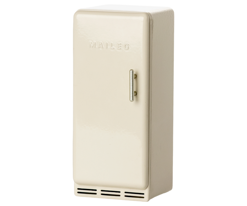 A Maileg cream-colored retro mini refrigerator with a single door, vertical handle, and vent grilles at the bottom.
