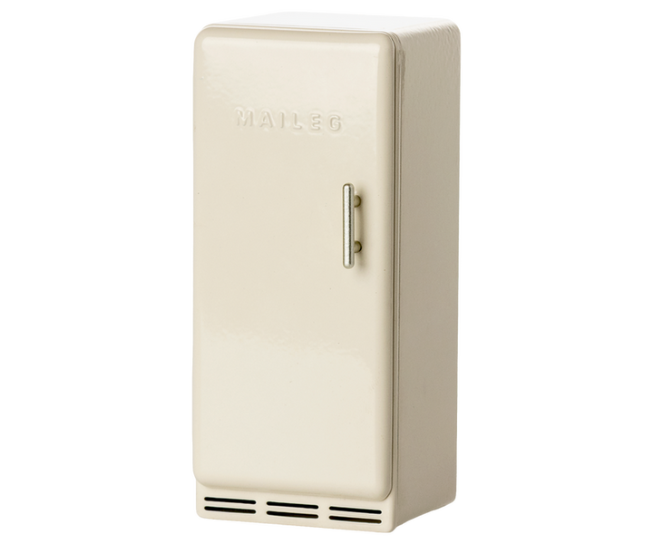 A Maileg cream-colored retro mini refrigerator with a single door, vertical handle, and vent grilles at the bottom.