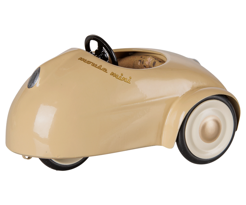 Mouse mini car in wheat with white wheels, floral seat, and wheat hub cap.