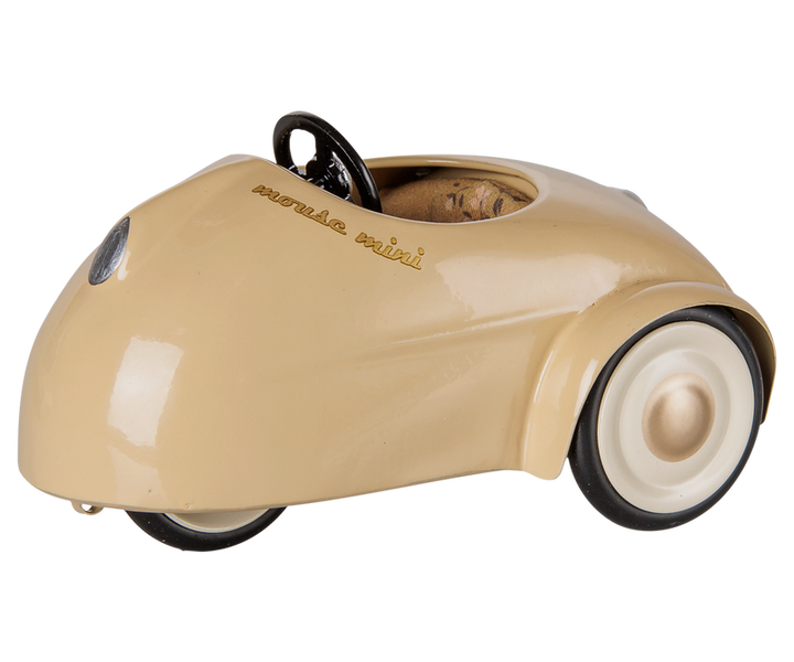 Mouse mini car in wheat with white wheels, floral seat, and wheat hub cap.