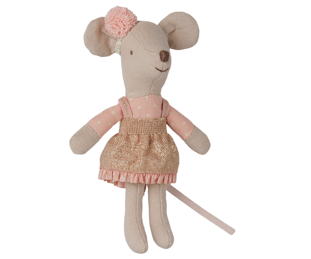 Little sister mouse wearing a pink and gold polka-dot dress with a matching pink pom-pom headband.